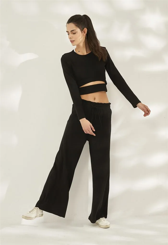Pantalon de yoga côtelé à taille paper-bag avec cordon de serrage en noir